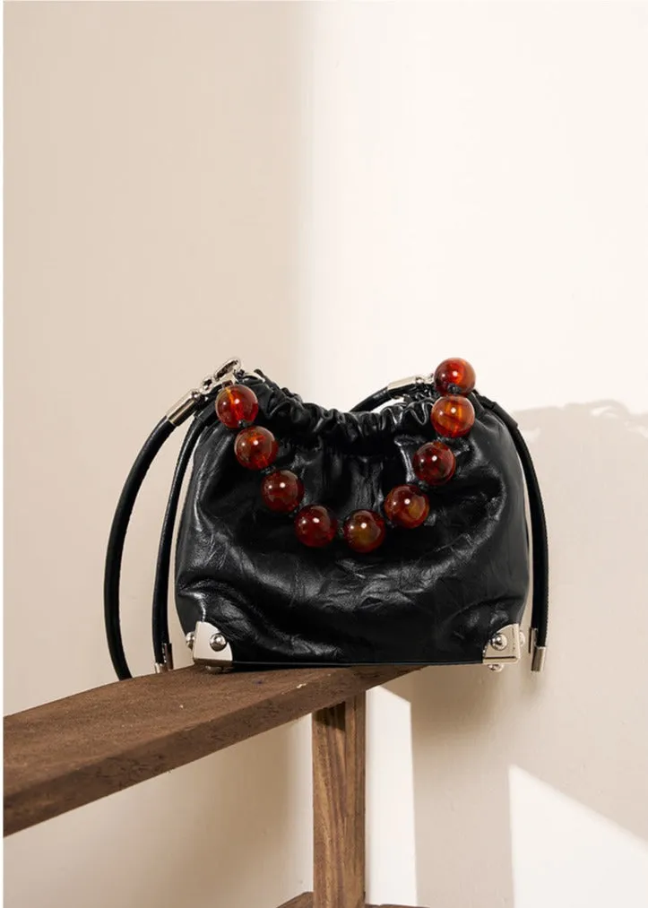 Grace Resin Handle Crossbody Beaded Bucket Bag | Leather Clutch with Floral Pleats