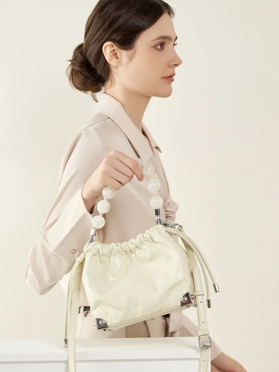 Grace Resin Handle Crossbody Beaded Bucket Bag | Leather Clutch with Floral Pleats